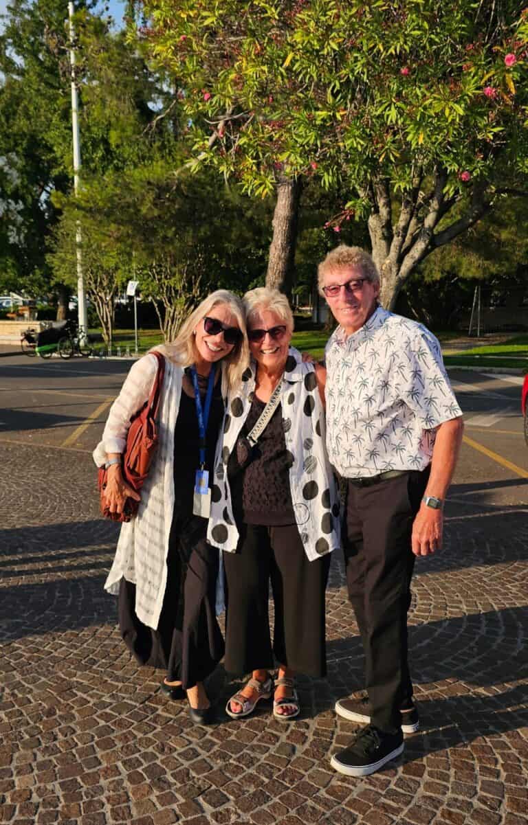 Secret Italia guests and tour director on a sunny afternoon in Italy