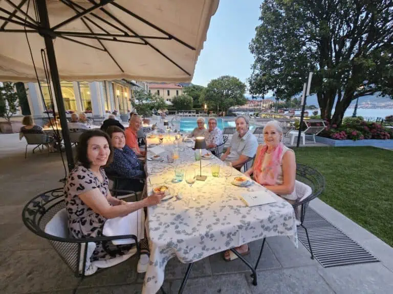 Secret Italia group at a lakeside terrace dinner
